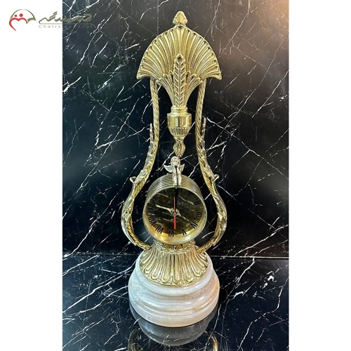خرید، قیمت و مشخصات ساعت رو میزی برنزی لاکچری و جدید طرح طاووس طلایی و پایه سنگی سفید زیر قیمت | چترزندگی