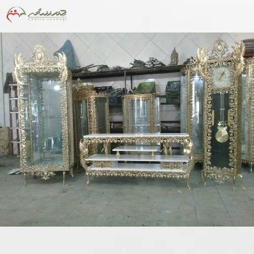 خرید، قیمت و مشخصات پک کامل عروس شامل ویترین و ساعت و میز تلویزیون و آینه کنسول و برنزی - چترزندگی