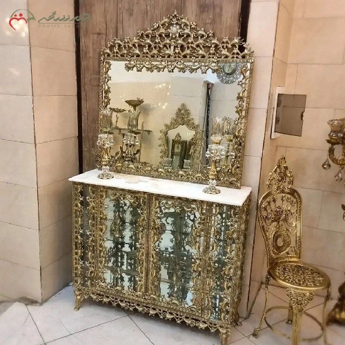 خرید، قیمت و مشخصات آینه کنسول بوفه دار همراه دو عدد شمعدان و ساعت رومیزی برنزی با گارانتی رنگ محصول - چترزندگی