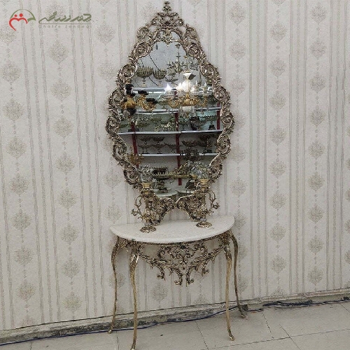 خرید، قیمت و مشخصات آینه کنسول برنزی همراه ست شمعدان برنزی و آینه طرح بیضی و رنگ ثابت بدنه با ضمانت - چترزندگی