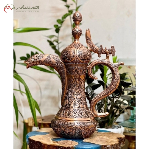خرید، قیمت و مشخصات دله قهوه عربی قلمزنی شده ی طرح چهره با رنگ مسی بسیار زیبا و بدنه ای از جنس برنج با ضمانت - چترزندگی