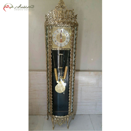 خرید، قیمت و مشخصات ساعت ایستاده برنزی نیم گرد با پس زمینه مشکی، آونگ دار مدل تاج دار، ارزان و با کیفیت _ چترزندگی