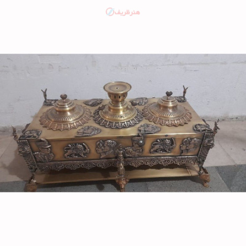 خرید آنلاین، منقل سماوری با قلم زنی طرح شیرو شمشیر، جنس برنج با دو محفظه زغال سفارشی ساز، کیفیت بالا، زیر قیمت بازار | چترزندگی
