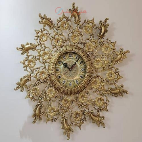 خرید آنلاین، ساعت دیواری طرح گل و پر، جنس آلیاژ آلومنیوم، آبکاری برنج همراه با ضمانت نامه، زیر قیمت بازار | چترزندگی