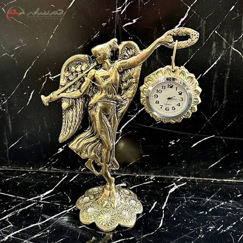 خرید، قیمت و مشخصات ساعت ایستاده برنزی مدرن طرح ملکه بالدار گیتاریست طلایی رنگ ارزان قیمت - چترزندگی