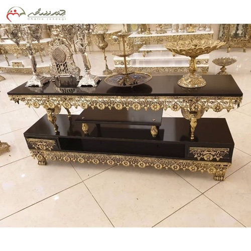میز تلویزیون جنس آلیاژ با روکش برنز و ام دی اف طرح فرشته بالدار برجسته