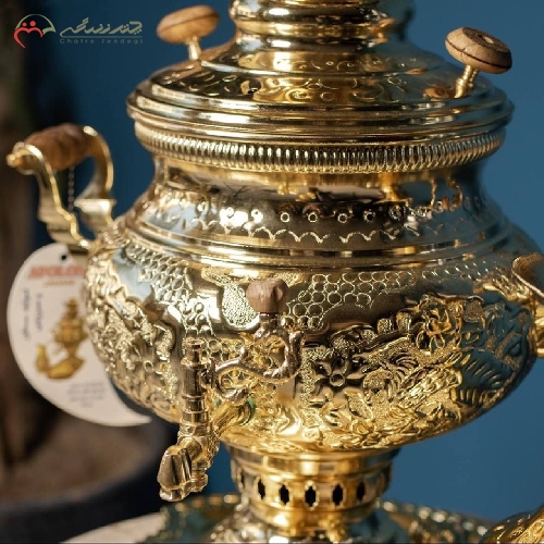 سماور زغالی برنجی طرح عدسی گل مرغ رنگ طلایی و بدنه کار شده با ضمانت 5 ساله