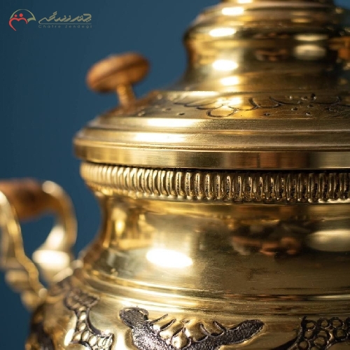 سماور زغالی برنجی سیاه قلم با طرح عدسی و قلم گل و مرغ