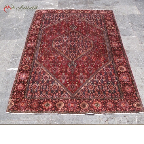 فرش دست بافت زنجان با زمینه لاکی رنگ و بافته شده با الیاف طبیعی دارای ضمانت کد 39134 - چترزندگی