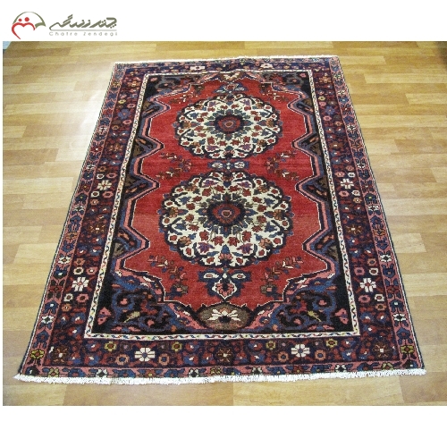 فرش دستبافت طرح ترنج بافته شده ی بختیار با ضمانت رنگ و دوام نخ فرش کد 39518