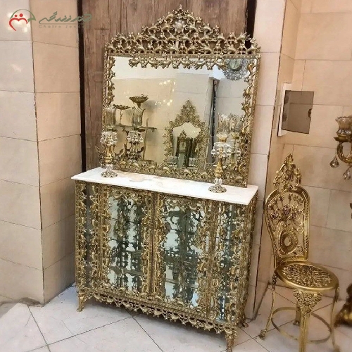 آینه کنسول بوفه دار همراه دو عدد شمعدان و ساعت رومیزی برنزی با گارانتی رنگ محصول