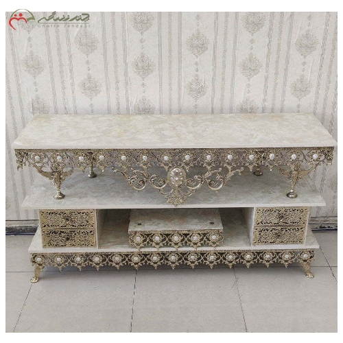 میز تلویزیون برنزی بدنه ظریف کاری شده ی طرح آفتابگردان تاج دار سنگین، چهار کشو با گارانتی