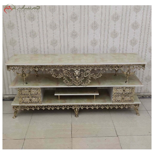 میز تلویزیون برنزی چهار کشو مدل گل نقلی با رویه ام دی اف و رنگ فورتیک درجه یک با گارانتی کد 9305 - چترزندگی