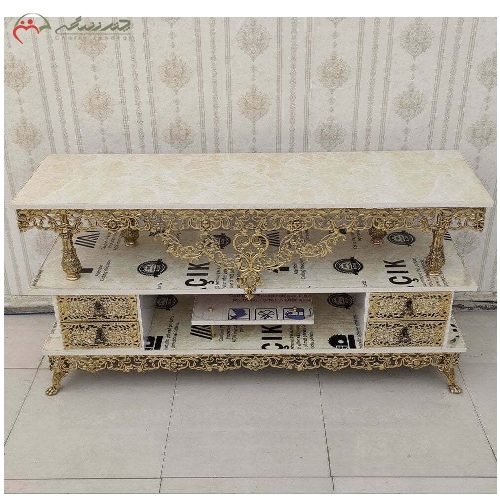 میز تلویزیون برنزی چهار کشو طراحی شیک گل سرخ و بدنه ی کار شده با گارانتی
