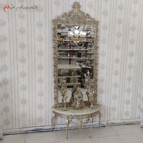 آینه کنسول تمام برنزی طرح گل سرخ همراه با ساعت و شمعدان طرح فرشته، به قیمت تولیدی