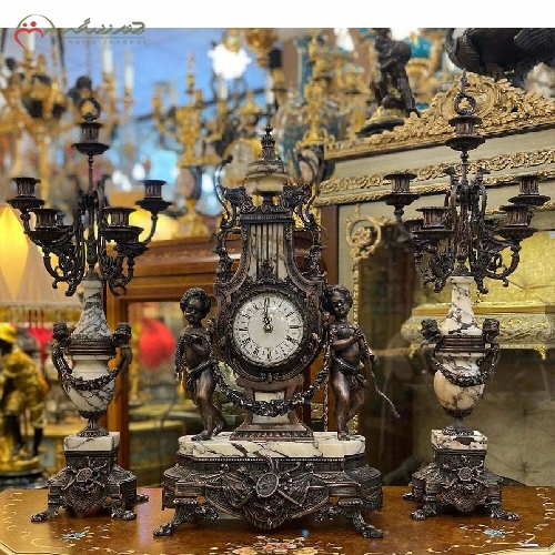 ست ساعت و شمعدان برنزی طرح عقابی به رنگ آنتیک و سنگ مشکی به کار رفته در بدنه کد 464