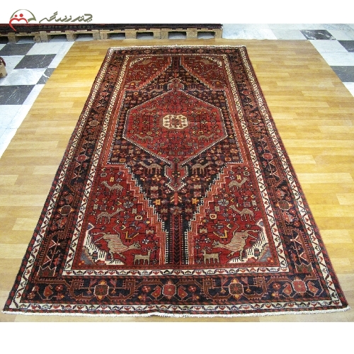 فرش دستبافت تویسرکان رنگ زمینه ی سرمه ای طرح لچک و ترنج، با الیاف طبیعی و رنگ ثابت کد 39973 - چترزندگی