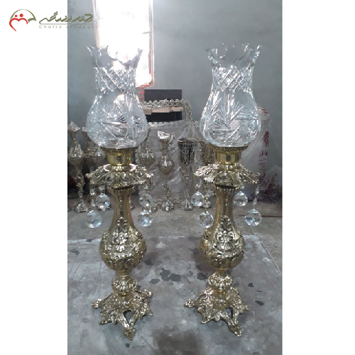 شمعدان برنزی آویز دار طرح تاج دار_ چترزندگی
