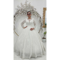 خرید، قیمت و مشخصات لباس عروس یقه خورشیدی با پارچه دونه کنجدی و بالاته پرکار از وبسایت خدمات ازدواج چترزندگی